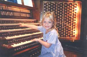 preschooler_plays_the_organ