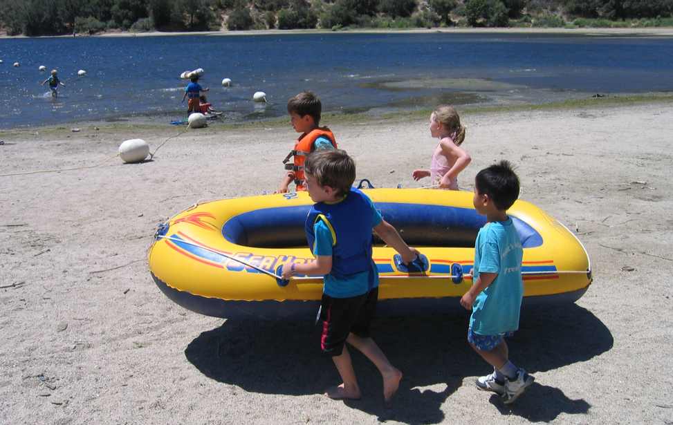 students_launching_inflatable_boat